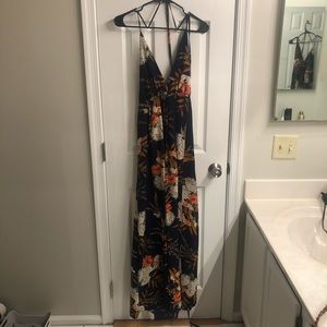 Navy blue floral maxi dress. deep v & open back